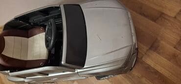 masin ucun xor xor: Uşaqlar üçün nəzərdə tutulmuş bu elektrikli minik avtomobili gümüşü — 2