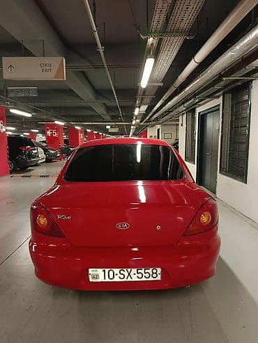 triangle teker: Kia Rio: 1.5 l | 2002 il Sedan — 3