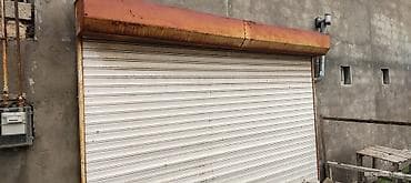 demir zaborlar: Metall jalüz qapı,hal hazırda sökülübdaşınmağa hazır vəziyyətdədir — 1