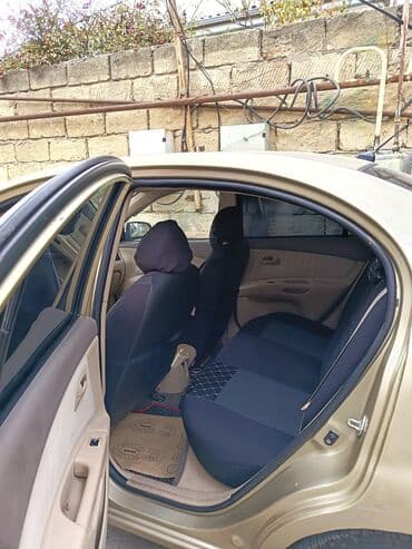 k5 kia: Kia Rio: 1.4 l | 2008 il Sedan — 6