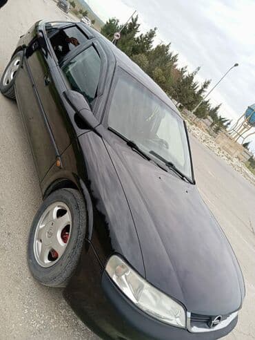 qubada ucuz avtomabiller: Opel Vectra: 1.8 l | 1998 il Hetçbek — 6