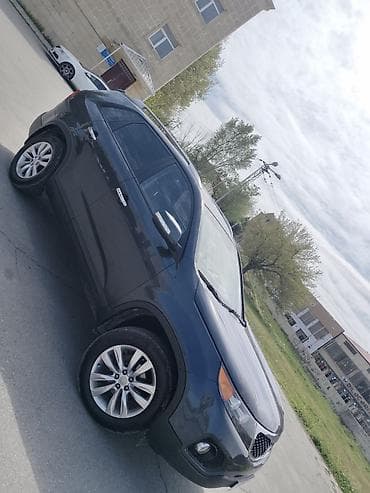 e 3 2: Kia Sorento: 2 l | 2010 il Ofrouder/SUV — 4