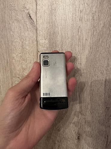 philips xenium 9@9d: Nokia rəng - Gümüşü, Düyməli — 2