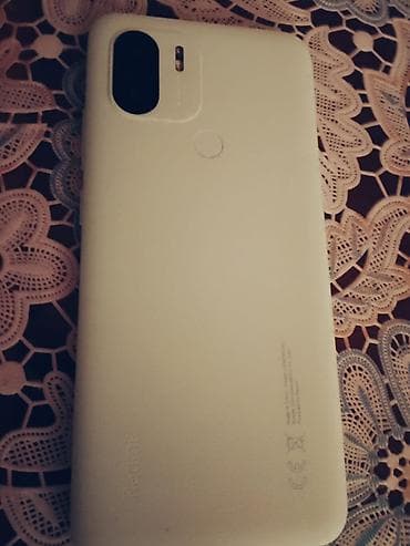 xiaomi mi max: Xiaomi Redmi smartfon - Modell: Redmi (arka qapaqda “Redmi” loqosu) — 2