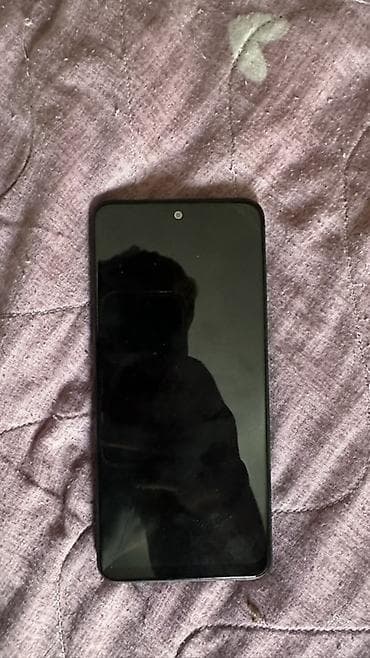 note 30: Xiaomi Redmi smartfon - Model: Redmi (şəkildəki arxa qapaqda “Redmi” — 2