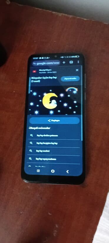 TCL smartfon - Rəng: Açıq mavi - Arxa paneldə barmaq izi skaneri -
