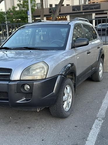 Hyundai Tucson: 2 л | 2005 г. Кроссовер — 2