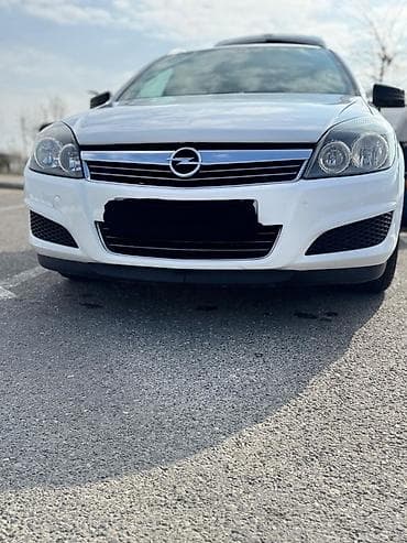 afdomobil: Opel Astra Caravan (Universal) - Kuzzov: universal (Caravan), ağ rəng — 6