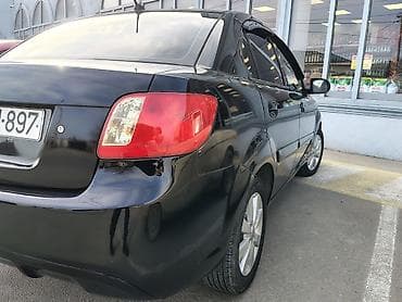 kia ceed 2010: Kia Rio: 1.4 l | 2010 il Sedan — 4