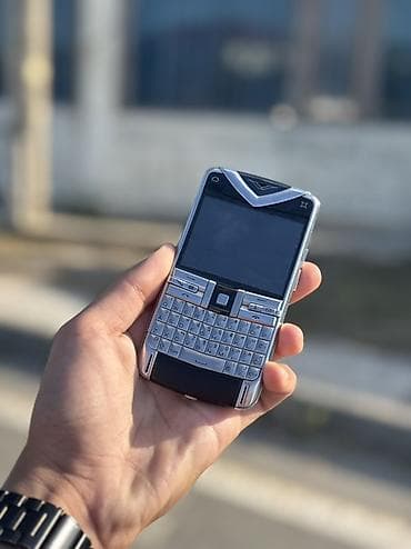Vertu Constellation Quest, цвет - Серебристый, Кнопочный — 1