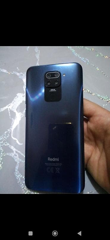 planşetlər və qiymətləri: Xiaomi Redmi (model arxa qapaqda “Redmi” loqosu ilə). Rəng: tünd mavi — 1