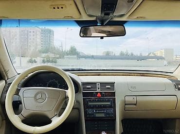 mercedes 190e: Mercedes-Benz C-Class: 2.3 l | 1997 il Sedan — 5