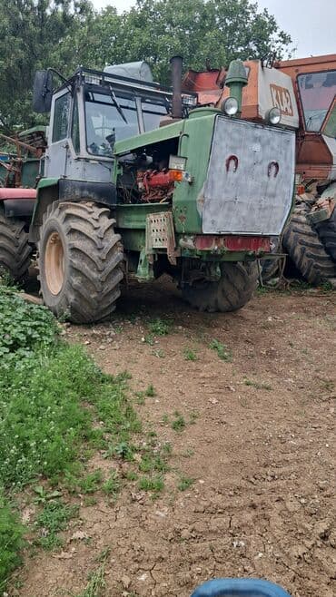 инвертор с 12 на 220 вольт: Yaşıl rəngdə olan bu traktor təsərrüfat işləri üçün yararlıdır. Kənd — 1