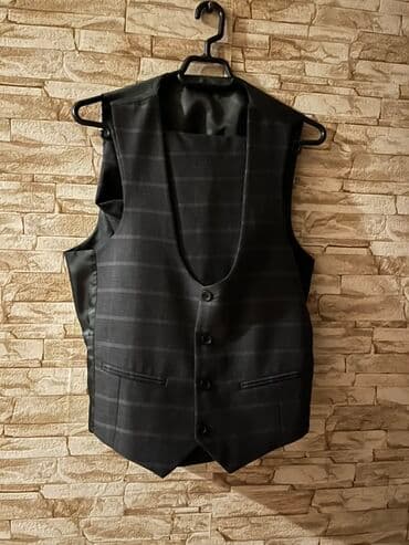 aslan pencesi qiymeti: Kişi kostyum dəsti – qara rəngdə, incə razmer 48 bey kostumu olub — 2