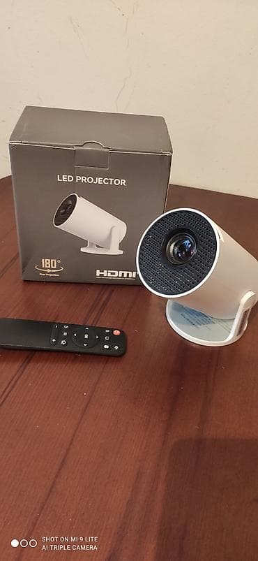 bas qirxan masinlar: Portativ Proyektor — 2