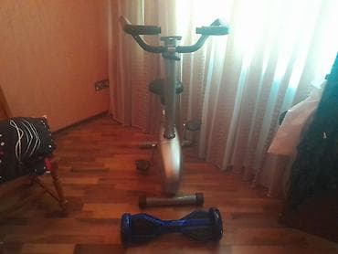 vele: Məhsul: Stasionar trenajor velosipedi və balans skuter Təsvir: - Evdə — 2