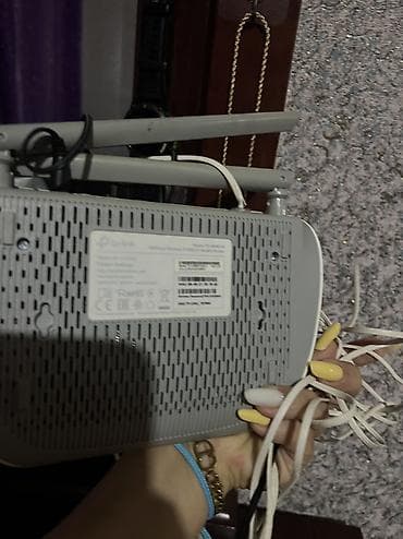 ev modemi: TP-Link TD-W8961N ADSL2+ Wi‑Fi router Xüsusiyyətlər: - Model: TP-Link — 3