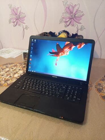 samsung tab 3 7 0: Toshiba noutbuk - Rəng: qara, teksturalı qapaq səthi, TOSHIBA loqosu — 1