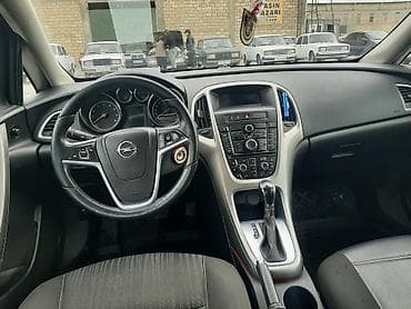 sükan lenti: Opel Astra: 1.4 l | 2011 il 188000 km Universal — 6