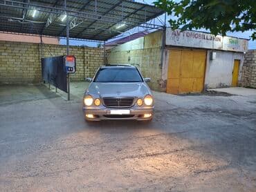 w210 kompressor: Mercedes-Benz E 220: 2.2 l | 2002 il Sedan — 4