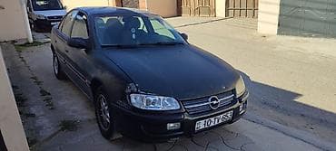 Su nəqliyyatı: Opel Omega B sedan - Kuzov: sedan, qara rəng - Mühərrik: benzin - — 1