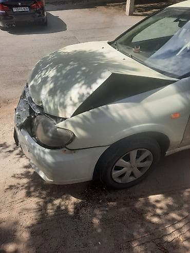 megan 3: Nissan Sunny: 1.3 l | 2006 il Sedan — 1