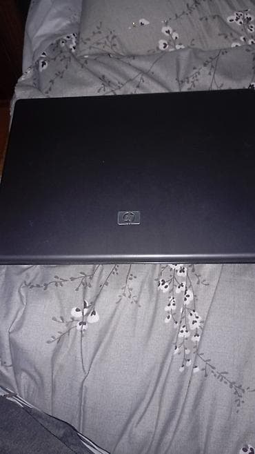 televizor ekran: HP noutbuk - Model: HP Compaq (alt hissədə “HP DriveGuard” qeyd — 2