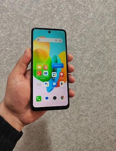 iphone 12 pro 2 el: Smartfon – qara rəng, geniş ekranlı və mərkəzdə deşikli ön kamera — 2