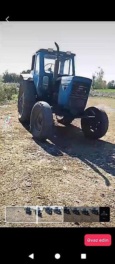 ural masin: Mavi rəngli təkərli traktor - Kabinli, qabaq və arxa işıqlarla - — 3