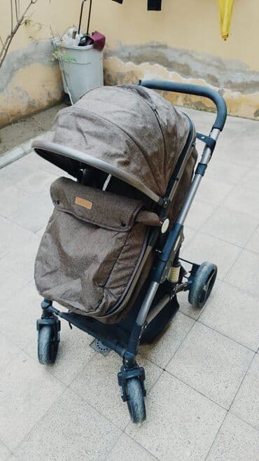 Kalyasqa ela veziyyetde. Sumkasi ustunde. + elave usaq.sebeti hediyye