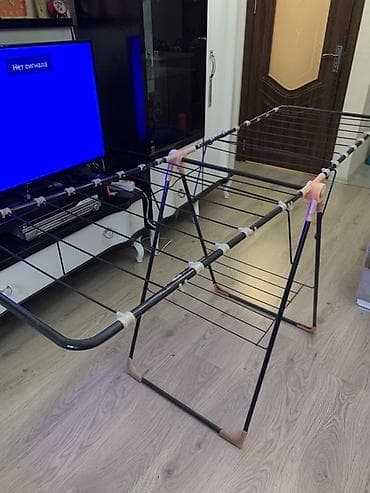 qamak nədir: Qatlana bilən paltarqurudan asılqan (podstavka) - Material: metal — 2