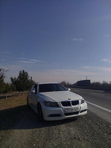 opel zafira b: BMW 3 series: 2 l | 2006 il Sedan — 2