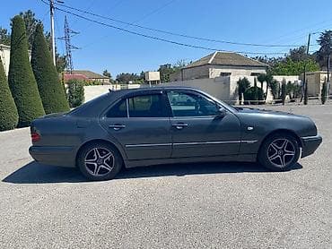 03 masin: Mercedes-Benz E 230: 2.3 l | Sedan — 4