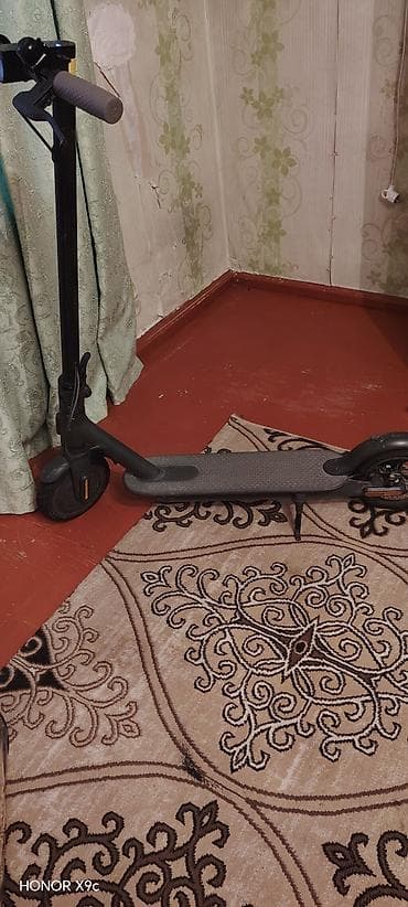 electro samokat: Elektrikli skuter – şəhər içi rahat gediş üçün - Rəng: qara - Korpus — 2