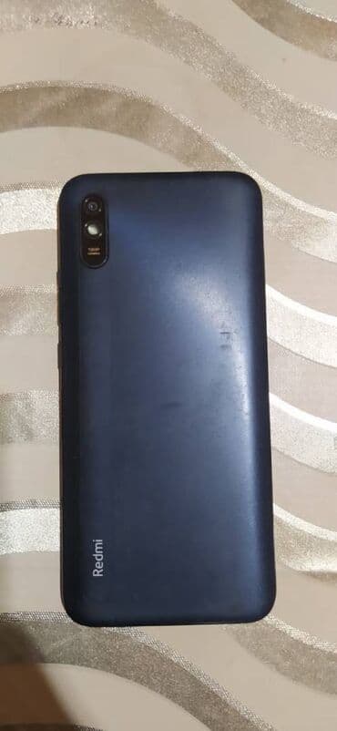 сотовый телефон fly ezzy 9: Redmi 9A, 32 ГБ, цвет - Голубой, Две SIM карты — 3