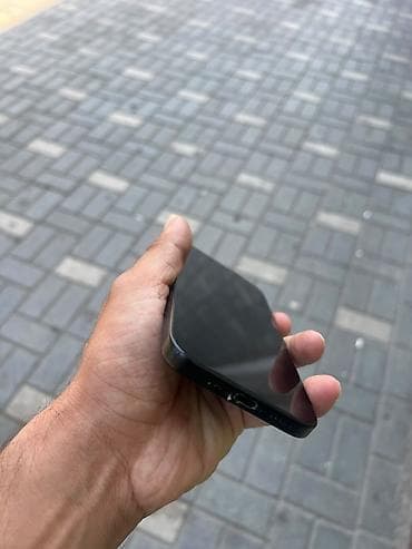IPhone 16, 128 GB, Qara, Simsiz şarj — 5