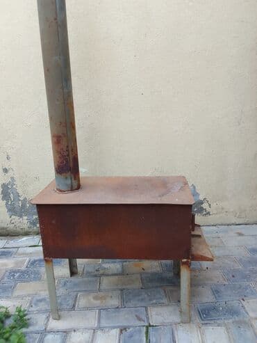 Odun peçi işlənmişqalın dəmirdən düdkeşnən bir yerdə satılır