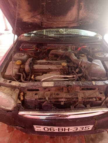 авто купить бу: Ford Escort: 1.6 л | 1998 г. Универсал — 4