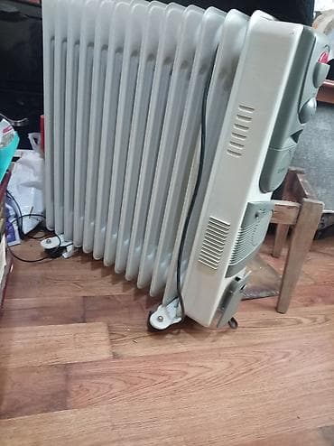 Yağlı radiator (elektrikli) 2 ededdi 1ededi 40 manat - 11 seksiyalı