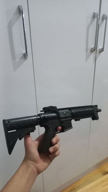 17 azn alinib 8 satilirRealist dizayna malik oyuncaq avtomat -