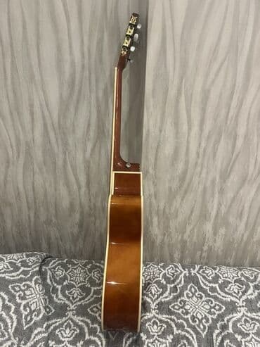 akustik gitara simi: Klassik/akustik gitara – cutaway (yuxarı deşikli) korpuslu model — 4