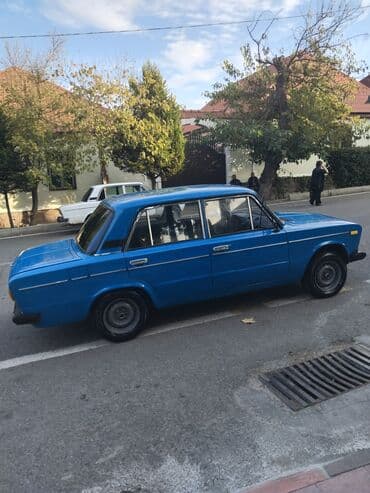 opel vectra b suret qutusu: VAZ 2106 sedan – mavi rəngdə, 4 qapı, klassik kuzov. Xüsusiyyətlər — 3