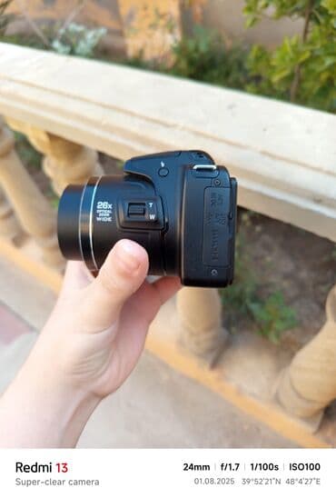 yemek bisiren aparat: Nikon brendinə məxsus qara rəngli fotoaparat, istifadəçilər üçün rahat — 9
