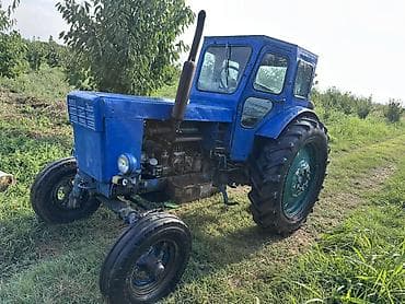 su ceken mator: 2 si bir yerde idayl vezyitde satlırMavi rəngli təkərli traktor və — 2