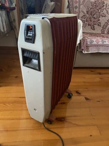 оконный кондиционер купить: Ağ və qırmızı rəngli, təkərli, daşınması asan yağlı qızdırıcı — 1