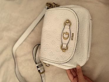 Çantalar: Guess canta original. Yaxsi veziyyetdedi
Az islenib — 3