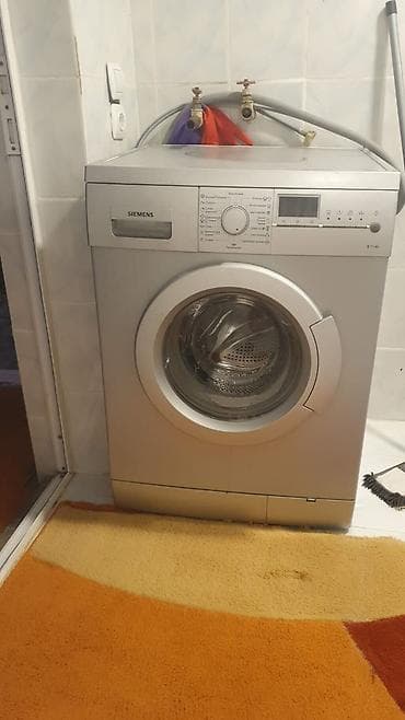 rom pro: Siemens paltaryuyan maşın. Öndən yüklənən modeldir və rəqəmsal — 1