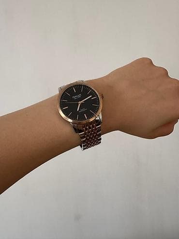 Qara siferblatlı və rose gold rəngli korpusu olan metal kəmərli OMAX lalafo.az -da Qara siferblatlı və rose gold rəngli korpusu olan metal kəmərli OMAX