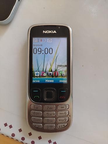 micro qulaq: Nokia rəng - Gümüşü, Düyməli — 1