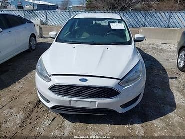 Ford Focus sedan, ağ rəng. - Kuzov: 4 qapılı sedan, aerodinamik qabaq
